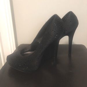 Black studded stiletto.